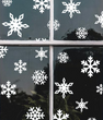 Новорічний декор - наклейки-сніжинки на скло 27 шт (H119)